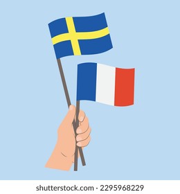 Flags of Sweden and France, Hand Holding flags