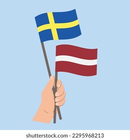 Flags of Sweden and Latvia, Hand Holding flags