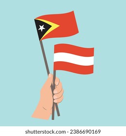 Flags of Timor Leste and Austria, Hand Holding flags