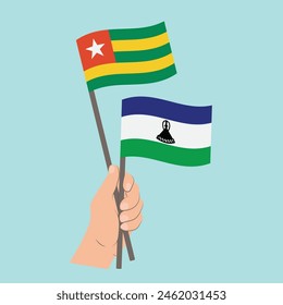 Flags Togo and Lesotho, Hand Holding flags