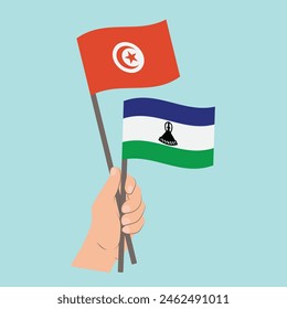 Flags Tunisia and Lesotho, Hand Holding flags