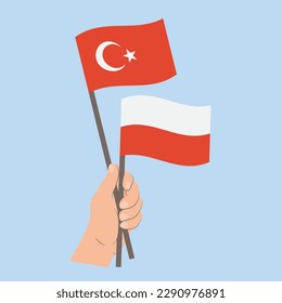Flags of Turkey and Poland, Hand Holding flags