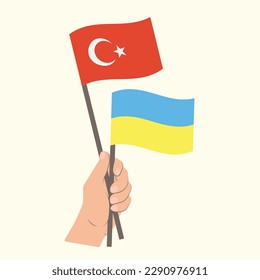 Flags of Turkey and Ukraine, Hand Holding flags