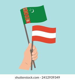 Flags of Turkmenistan and Austria, Hand Holding flags