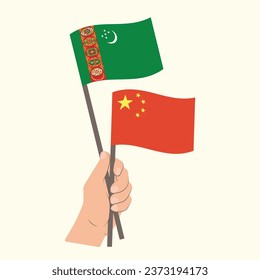 Flags of Turkmenistan and China, Hand Holding flags