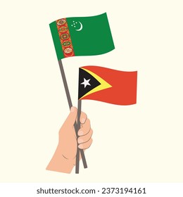 Flags of Turkmenistan and East Timor, Hand Holding flags