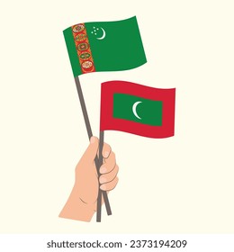 Flags of Turkmenistan and Maldives, Hand Holding flags