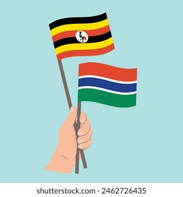 Flags Uganda and the Gambia, Hand Holding flags