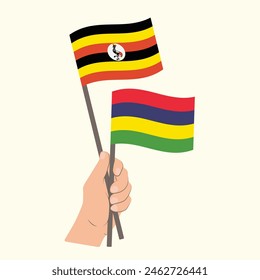 Flags Uganda and Mauritius, Hand Holding flags