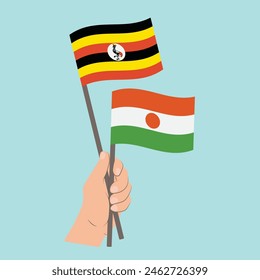 Flags Uganda and Niger, Hand Holding flags