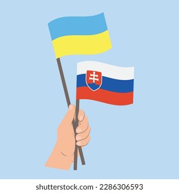 Flags of Ukraine and Slovakia, Hand Holding flags