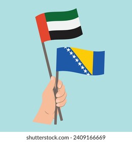 Flags of the United Arab Emirates and Bosnia and Herzegovina, Hand Holding flags