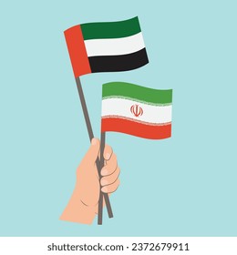 Flags of the United Arab Emirates and Iran, Hand Holding flags