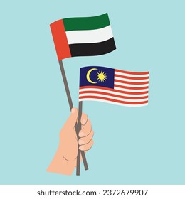 Flags of the United Arab Emirates and Malaysia, Hand Holding flags