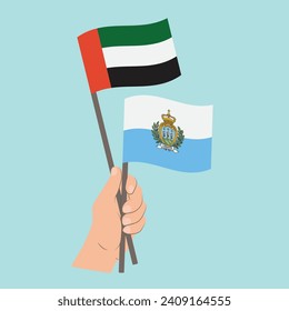 Flags of the United Arab Emirates and San Marino, Hand Holding flags