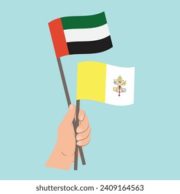 Banderas de los Emiratos Árabes Unidos y Ciudad del Vaticano, con banderas de mano