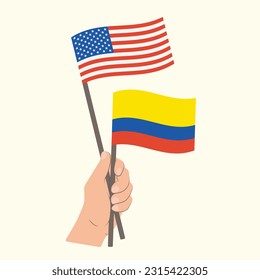 Flags of the USA and Colombia, Hand Holding flags