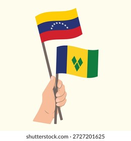 Banderas de Venezuela y San Vicente y las Granadinas, Mano sosteniendo banderas