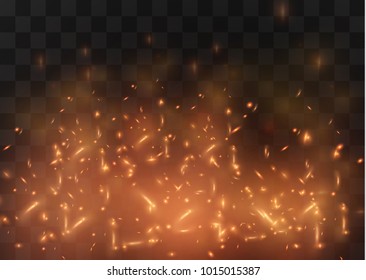 Flame of fire with sparks on a black background. The texture of the fiery storm. The fiery sparks of Boke's lights flash, a shot of a flying spark in the air.over a dark night.