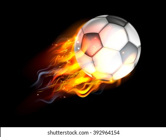 A flaming soccer football ball on fire flying through the air