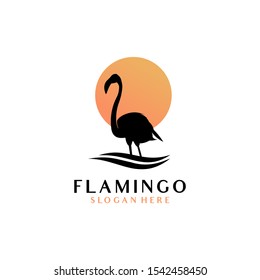 Flamingo logo, which stands in the water flow. Sunset behind the flamingo gives a natural impression that is beautiful and cool.
Beautiful flamingo logo.