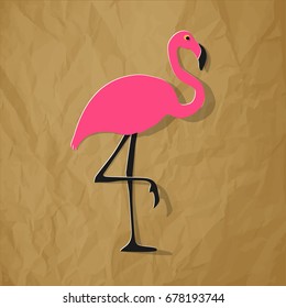 Flamingo pink on a crumpled paper brown background.