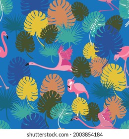 Flamingos and monstara leaves in vibrant colors and tropical theme. Designed in vector, seamless repeat pattern, ready to be printed on fabric, wallpaper, or children's bedding products. 