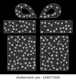 Flare mesh gift with glare effect. Abstract illuminated model of gift icon. Shiny wire frame polygonal network gift. Vector abstraction on a black background.