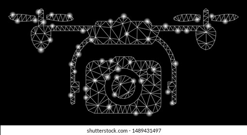 Flare mesh photo drone with glare effect. Abstract illuminated model of photo drone icon. Shiny wire frame polygonal mesh photo drone. Vector abstraction on a black background.