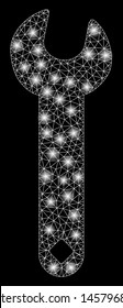 Flare mesh wrench with sparkle effect. Abstract illuminated model of wrench icon. Shiny wire frame polygonal mesh wrench. Vector abstraction on a black background.