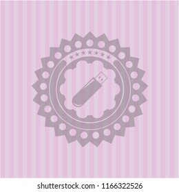 flash drive icon inside badge with pink background