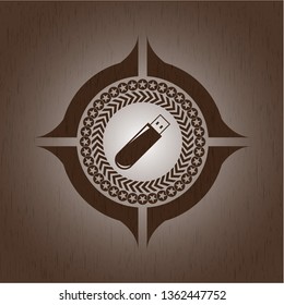 flash drive icon inside badge with wood background