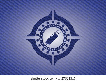 flash drive icon inside badge with denim texture