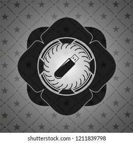 flash drive icon inside black emblem