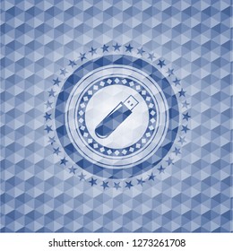 flash drive icon inside blue polygonal badge.