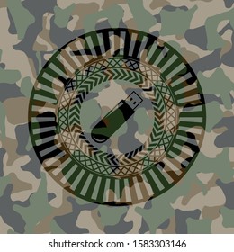 flash drive icon inside camouflaged emblem