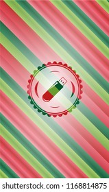 flash drive icon inside christmas badge.