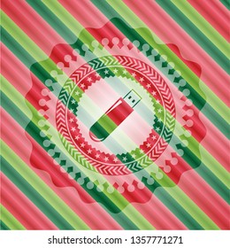 flash drive icon inside christmas emblem.