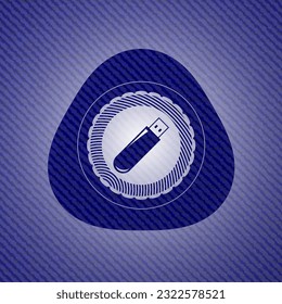 icono de la unidad flash dentro del emblema con textura jean. 