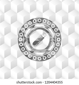flash drive icon inside grey badge with geometric cube white background