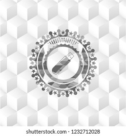flash drive icon inside grey icon or emblem with geometric cube white background
