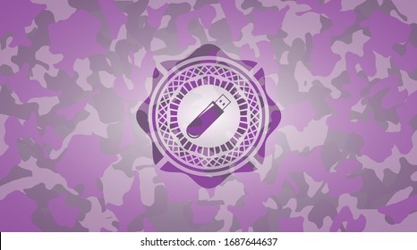 flash drive icon inside pink and purple camouflage emblem