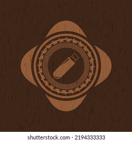 flash drive icon inside realistic wooden emblem. 