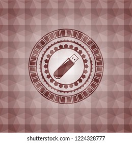 flash drive icon inside red seamless badge with geometric pattern background.