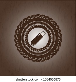 flash drive icon inside retro wood emblem