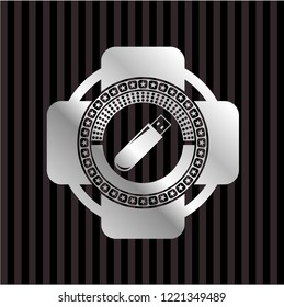 flash drive icon inside silver shiny badge
