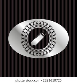 flash drive icon inside silver emblem. 