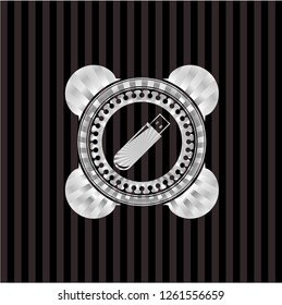 flash drive icon inside silvery emblem