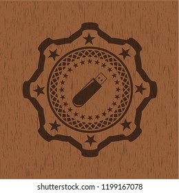 flash drive icon inside vintage wood emblem