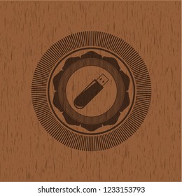 flash drive icon inside vintage wooden emblem